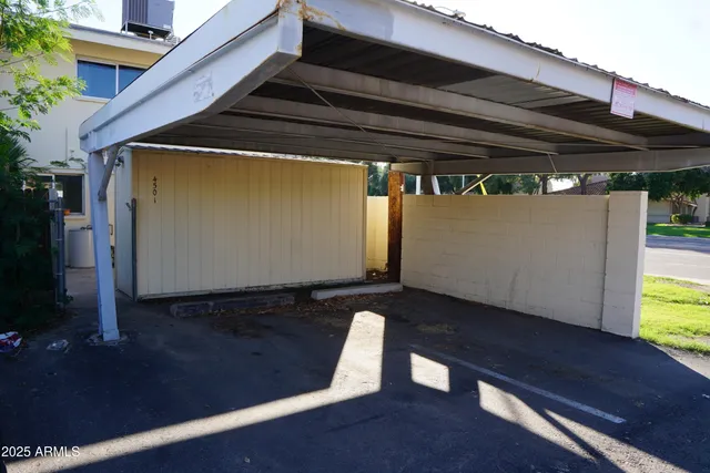 a view of swimming pool with sitting area