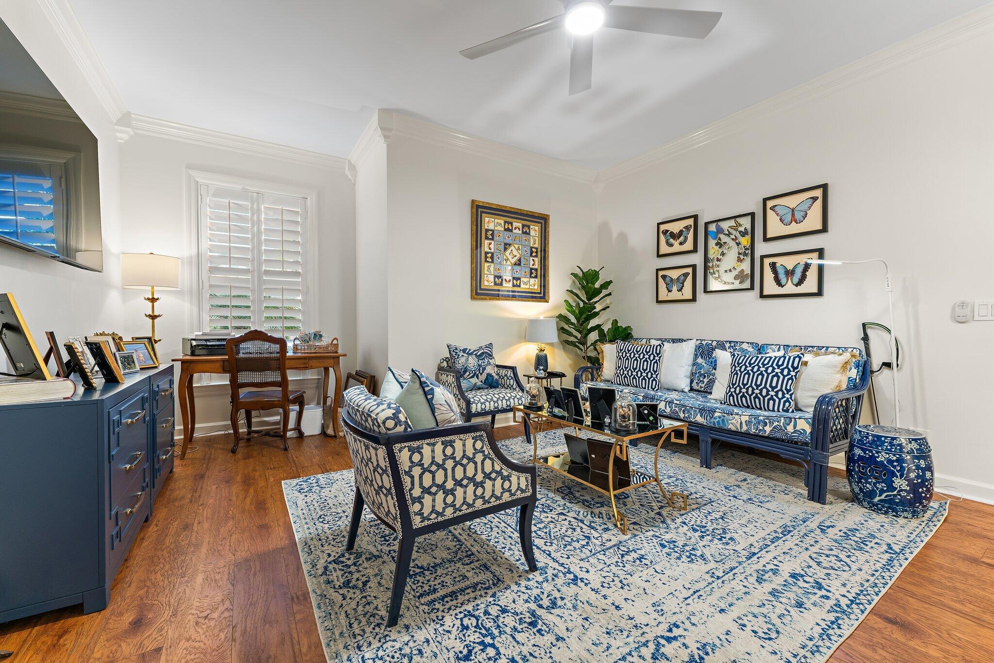 3230 West Channel Circle Jupiter, FL 33477 - Photo 20 of 67 a living room with furniture and wooden floor