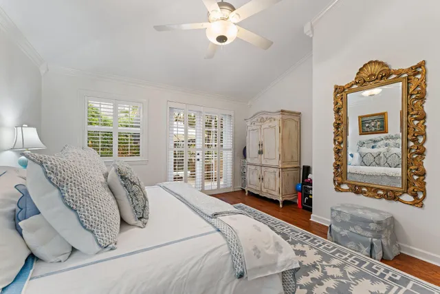a spacious bathroom with a tub sink double vanity granite and tub