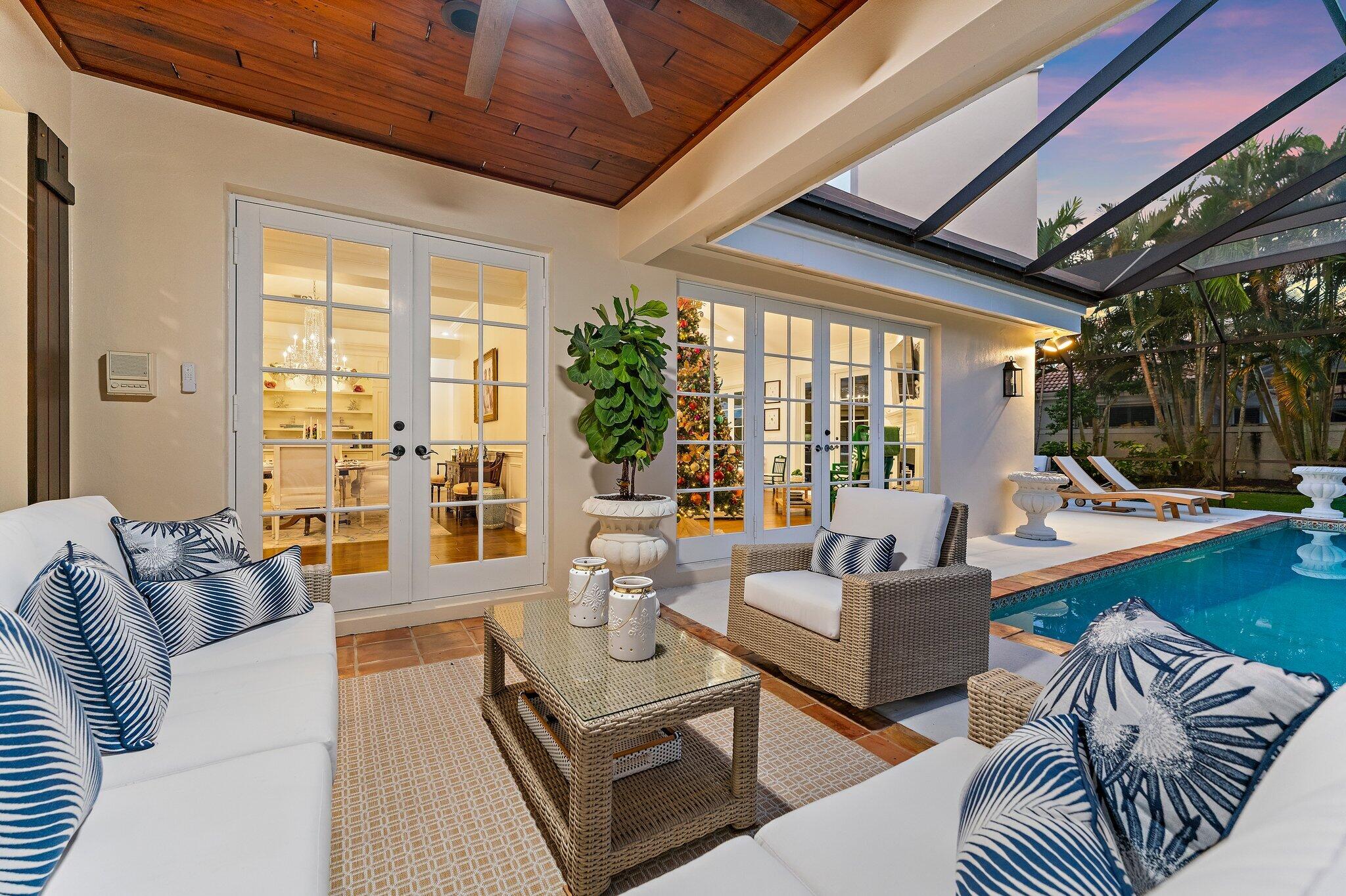 3230 West Channel Circle Jupiter, FL 33477 - Photo 40 of 67 a living room with furniture and a large window