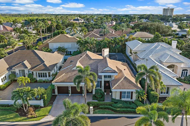 an aerial view of a house with swimming pool