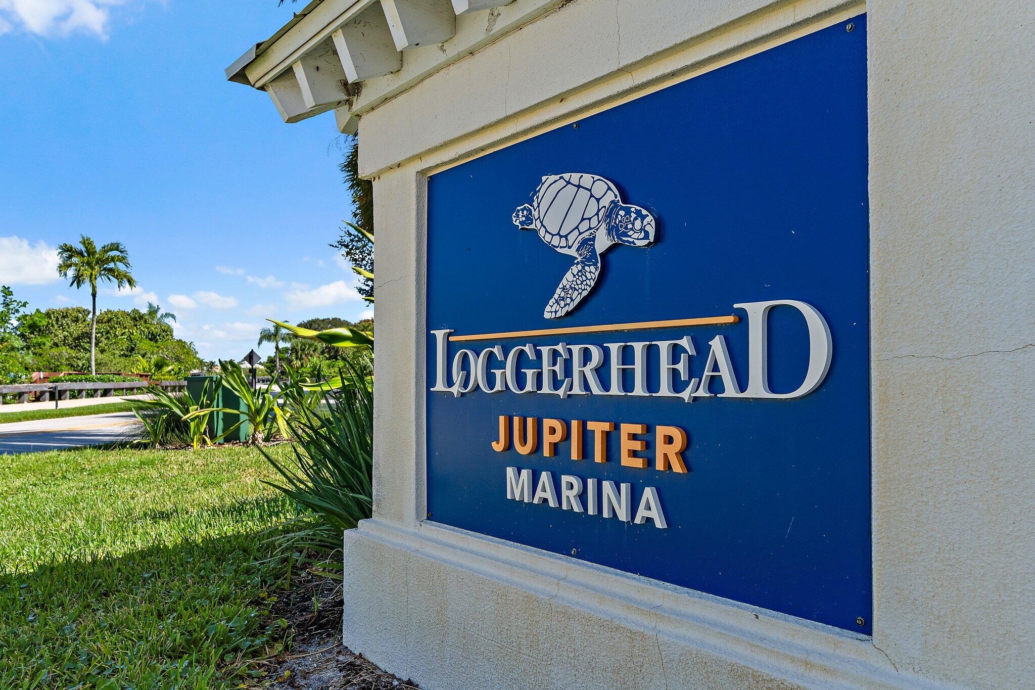 3230 West Channel Circle Jupiter, FL 33477 - Photo 57 of 67 a sign that is on the side of a building