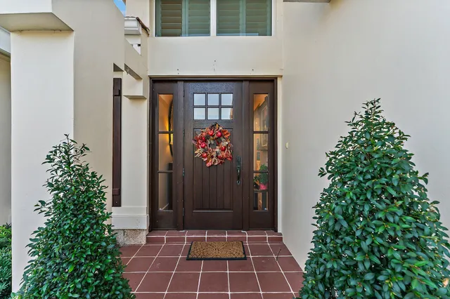 a living room with furniture toys and a large window