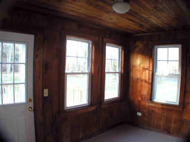 591 Colebrook River Road Tolland, MA 01034 - Photo 4 of 10 a view of an empty room with a window