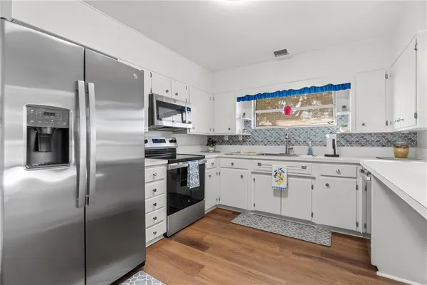 a view of a room with an ocean from a window