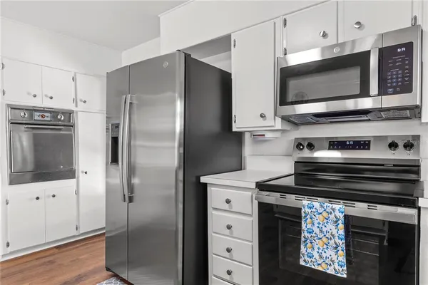 a view of a lake with a house