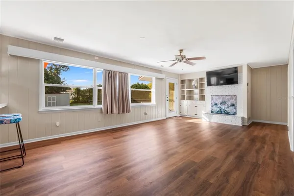 an aerial view of a house with a garden
