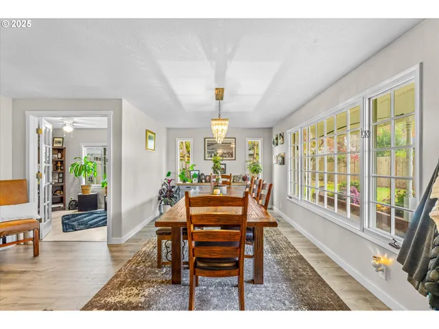 a dining room with furniture window wooden floor