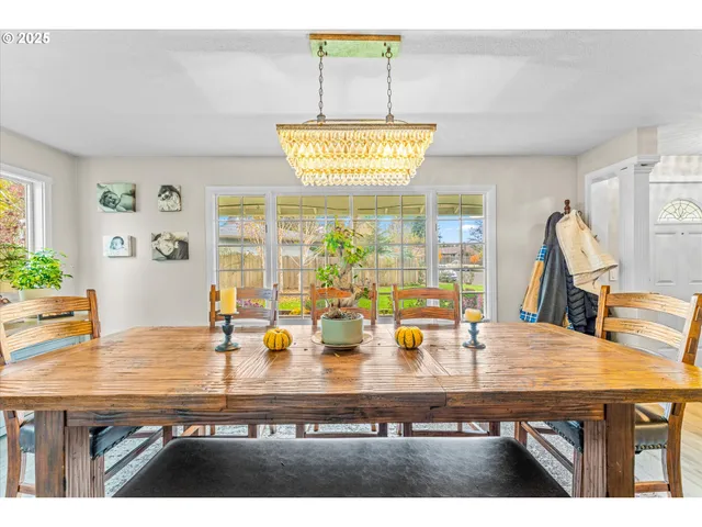 a kitchen with stainless steel appliances kitchen island granite countertop a refrigerator and stove