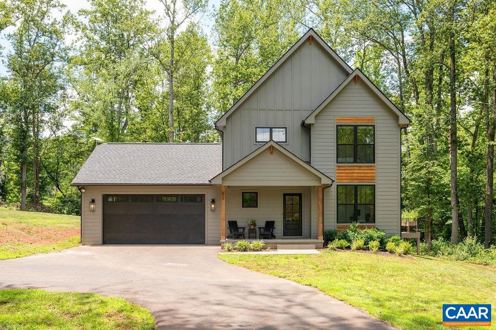 92 Key W Drive Charlottesville, VA 22911 - Photo 1 of 27 a front view of a house with a yard