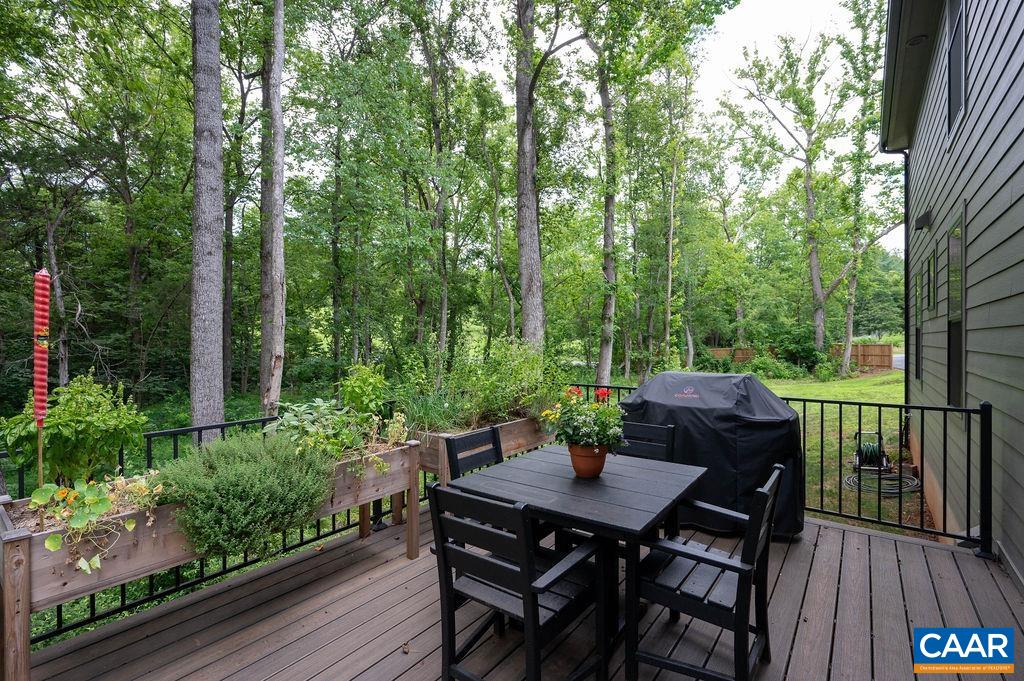 92 Key W Drive Charlottesville, VA 22911 - Photo 11 of 27 a view of a table and chairs in the patio