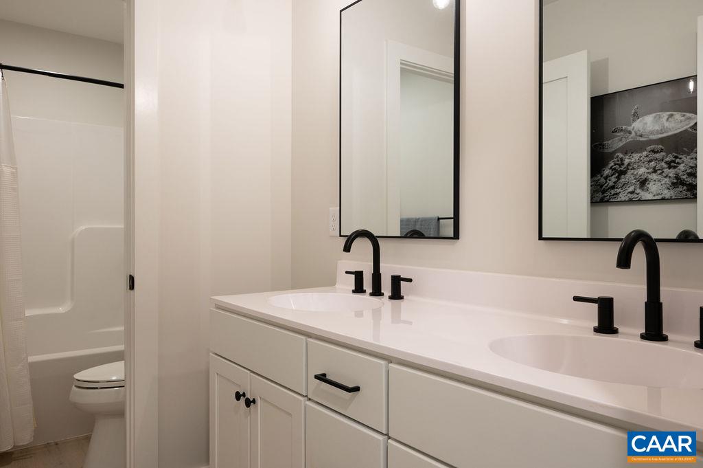 92 Key W Drive Charlottesville, VA 22911 - Photo 20 of 27 a bathroom with a sink and a toilet