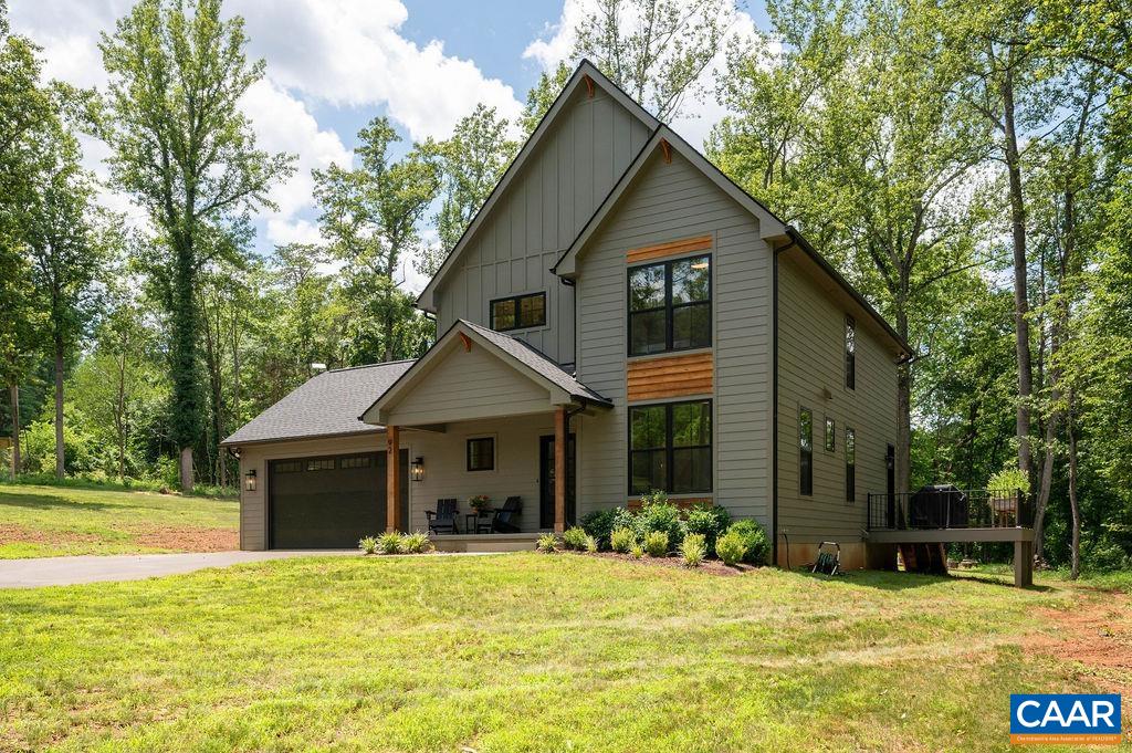 92 Key W Drive Charlottesville, VA 22911 - Photo 2 of 27 a front view of a house with a yard