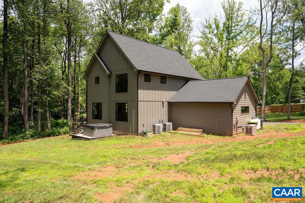 92 Key W Drive Charlottesville, VA 22911 - Photo 24 of 27 a front view of house with yard and seating area
