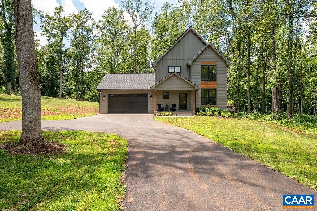 92 Key W Drive Charlottesville, VA 22911 - Photo 3 of 27 a front view of a house with yard and green space