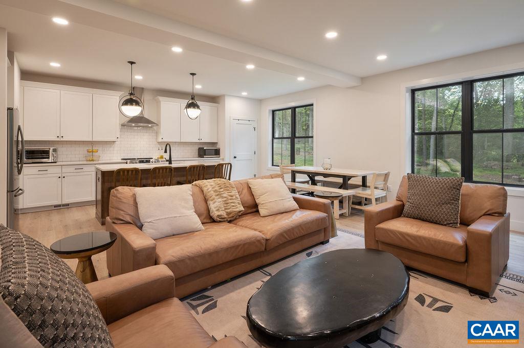 92 Key W Drive Charlottesville, VA 22911 - Photo 6 of 27 a living room with furniture kitchen and a large window