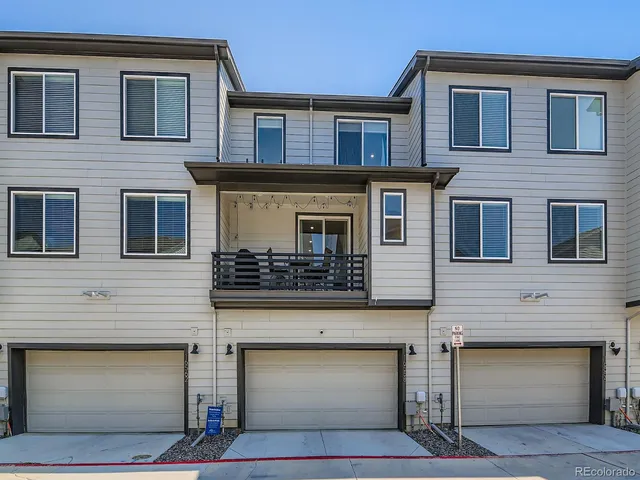 a front view of a house with a garage