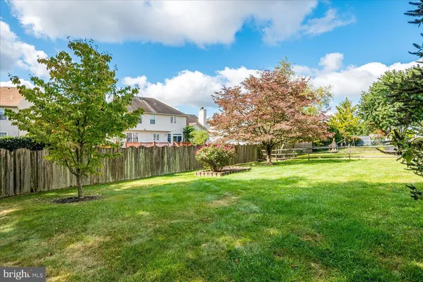 a view of a backyard with a garden