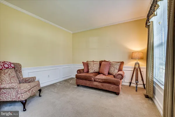 a living room with a couch and a table