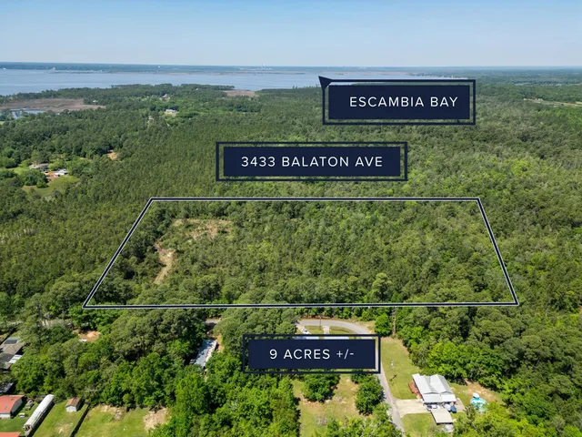 a view of a field with an outdoor space