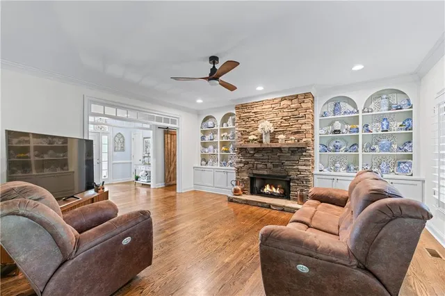 a kitchen with granite countertop a sink stove and cabinets