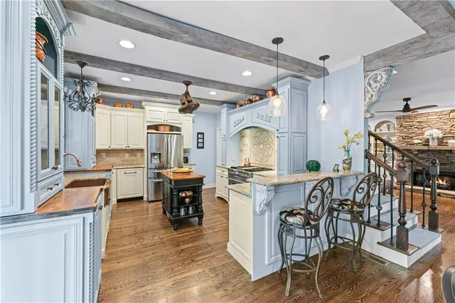 a view of a swimming pool with an outdoor seating