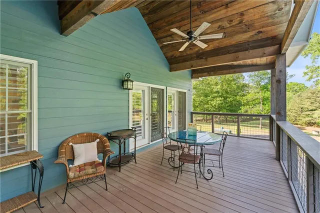 a view of a house with sitting area and furniture