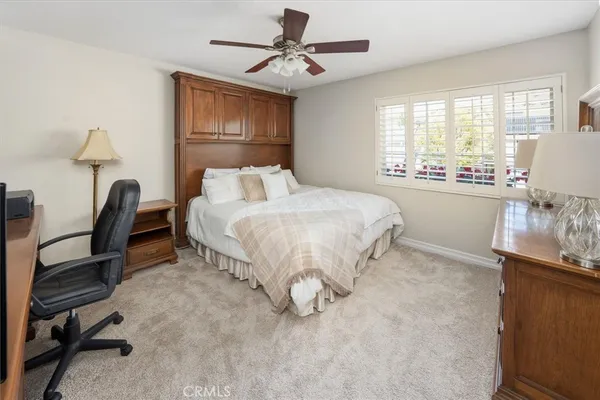 a view of a livingroom with furniture and a flat screen tv