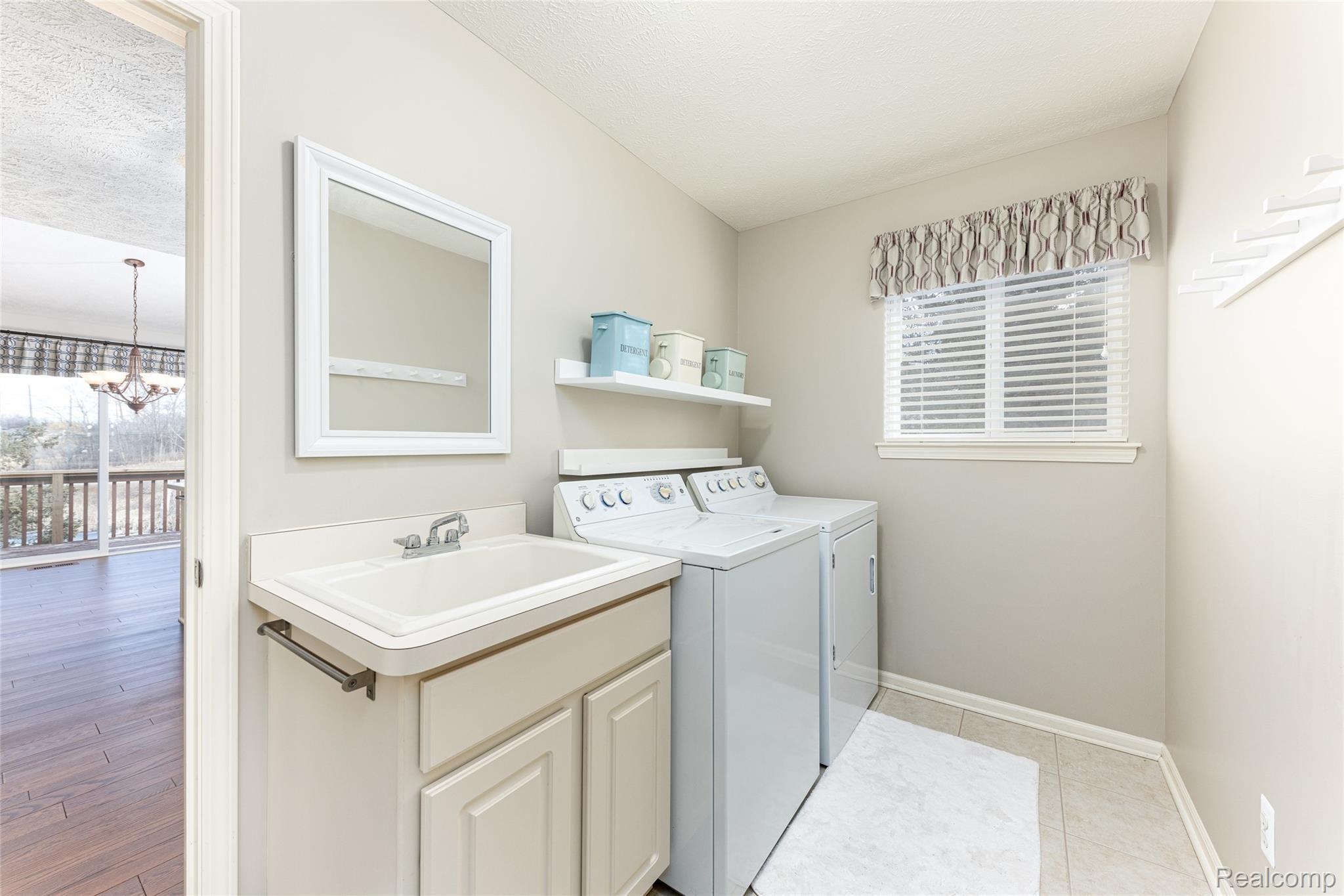 16 Sedum Road, Unit 1 Howell, MI 48843 - Photo 15 of 43 16LaundryMudroom16 Sedum Rd (26 of 43).jpg