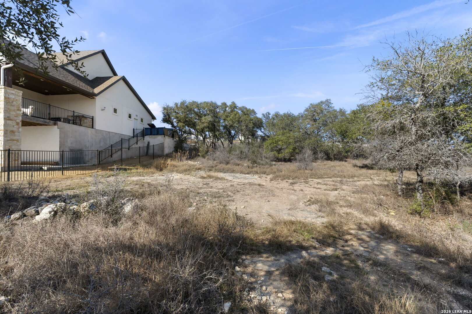 31045 Johnson Way Bulverde, TX 78163 - Photo 11 of 19 a view of a house with a yard