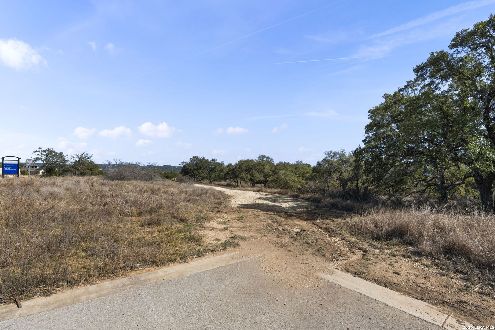 31045 Johnson Way Bulverde, TX 78163 - Photo 15 of 19 a view of a lake with mountains in the background