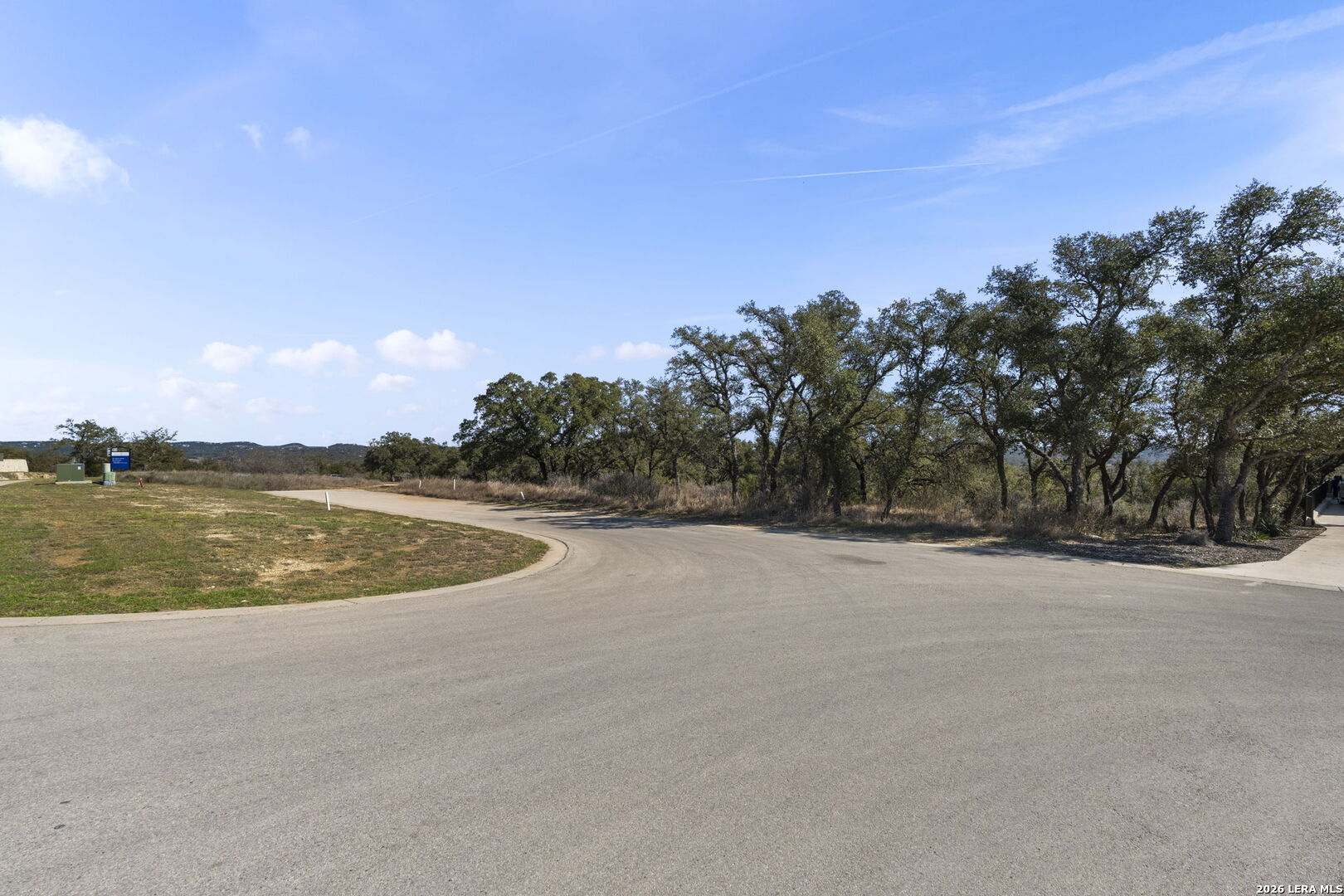 31045 Johnson Way Bulverde, TX 78163 - Photo 17 of 19 a view of a lake and trees