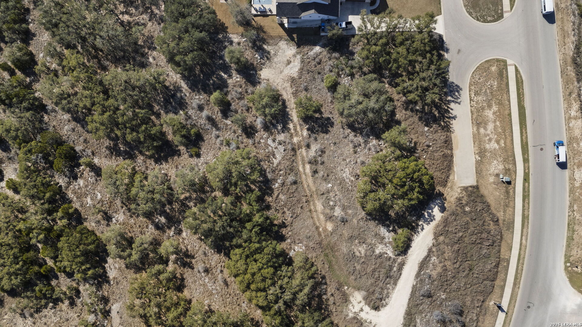 31045 Johnson Way Bulverde, TX 78163 - Photo 2 of 19 a view of a house with a yard and fountain