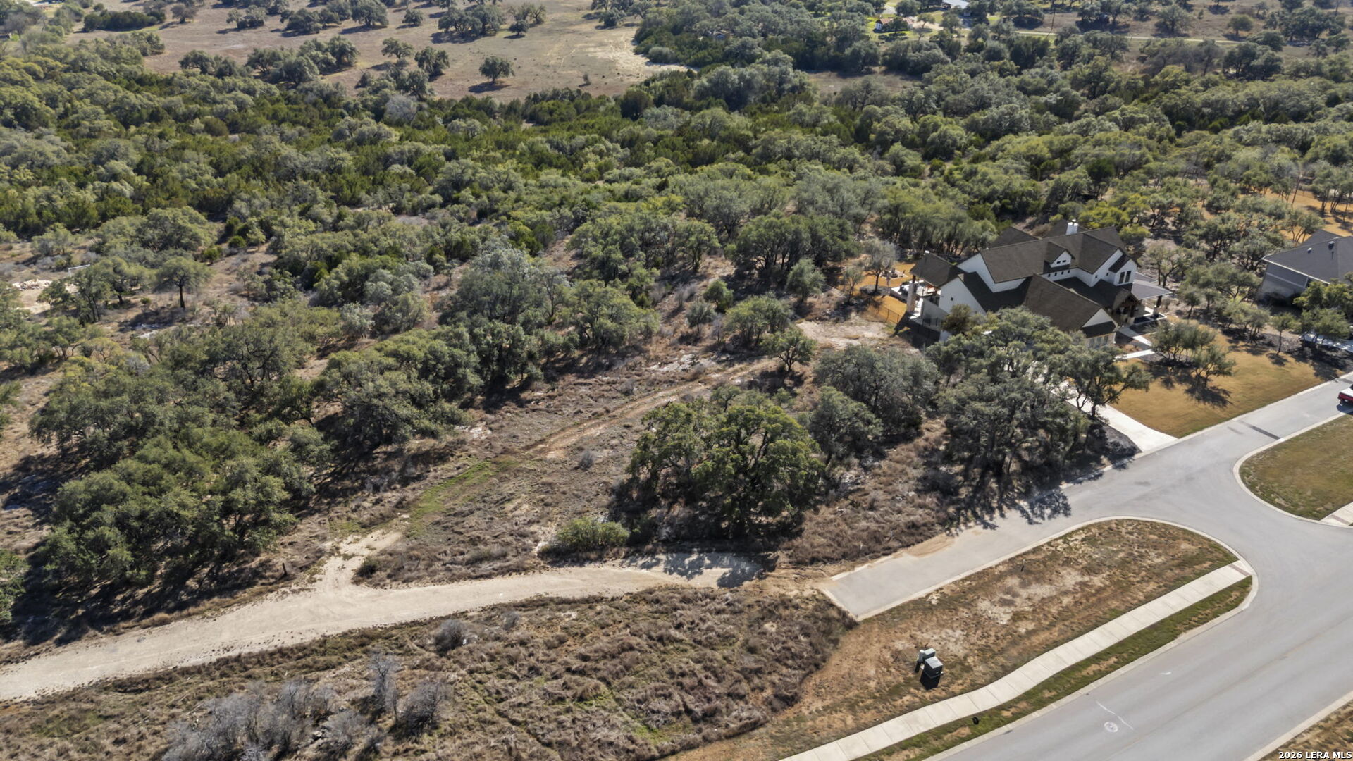 31045 Johnson Way Bulverde, TX 78163 - Photo 6 of 19 a view of a yard with wooden fence