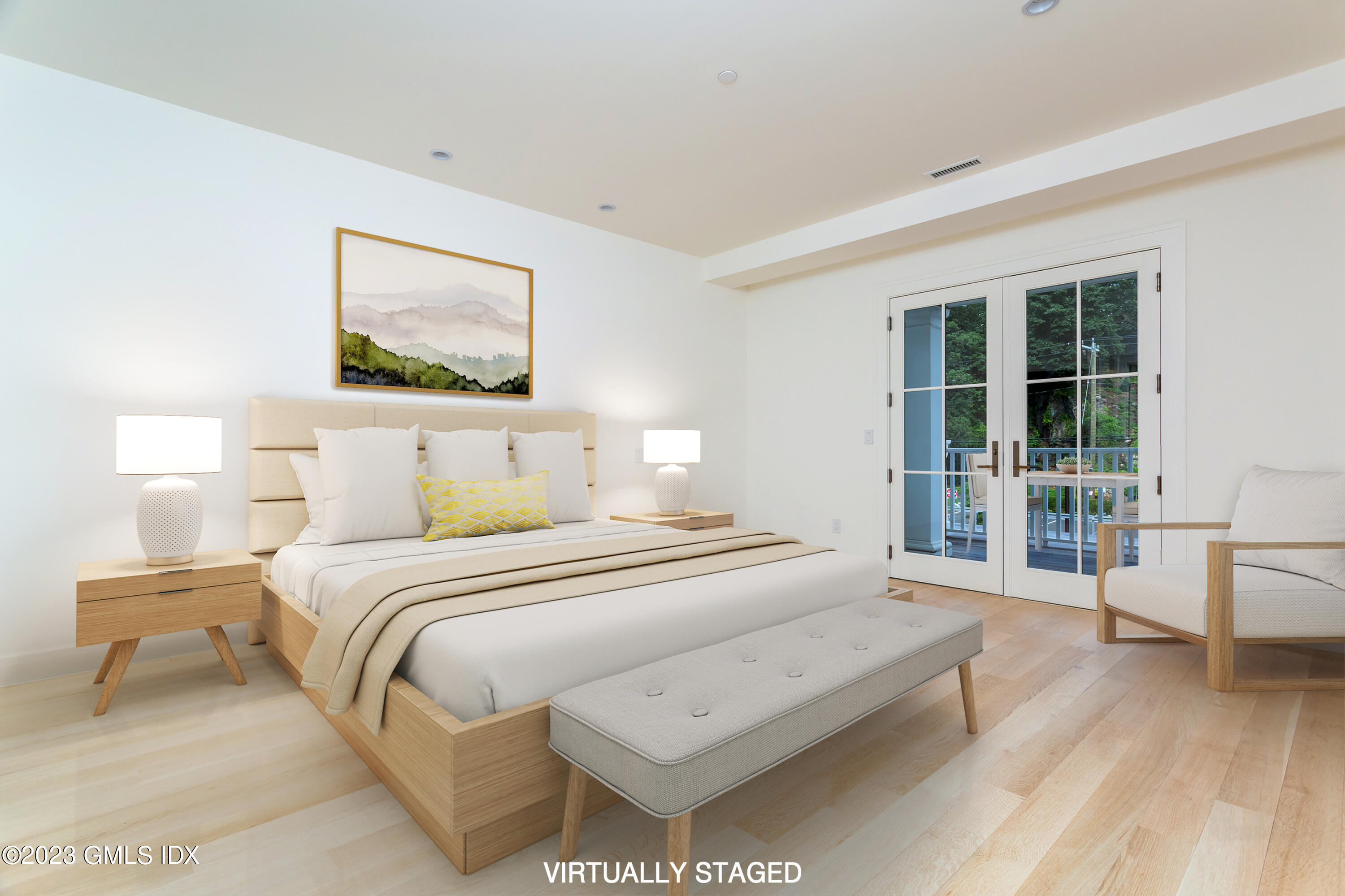 89 River Road, Unit 203 Cos Cob, CT 06807 - Photo 12 of 27 a bedroom with a bed and a large window