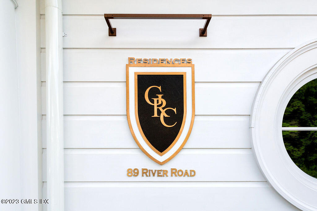 89 River Road, Unit 203 Cos Cob, CT 06807 - Photo 22 of 27 a close up of a sign board