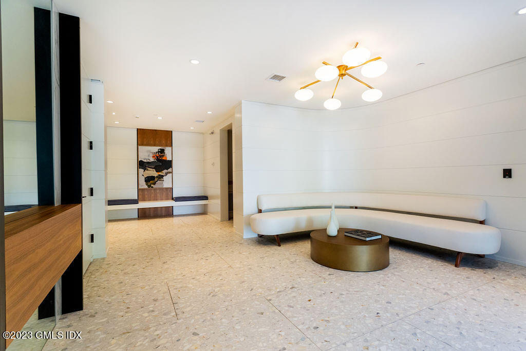 89 River Road, Unit 203 Cos Cob, CT 06807 - Photo 23 of 27 a view of an empty room with a window