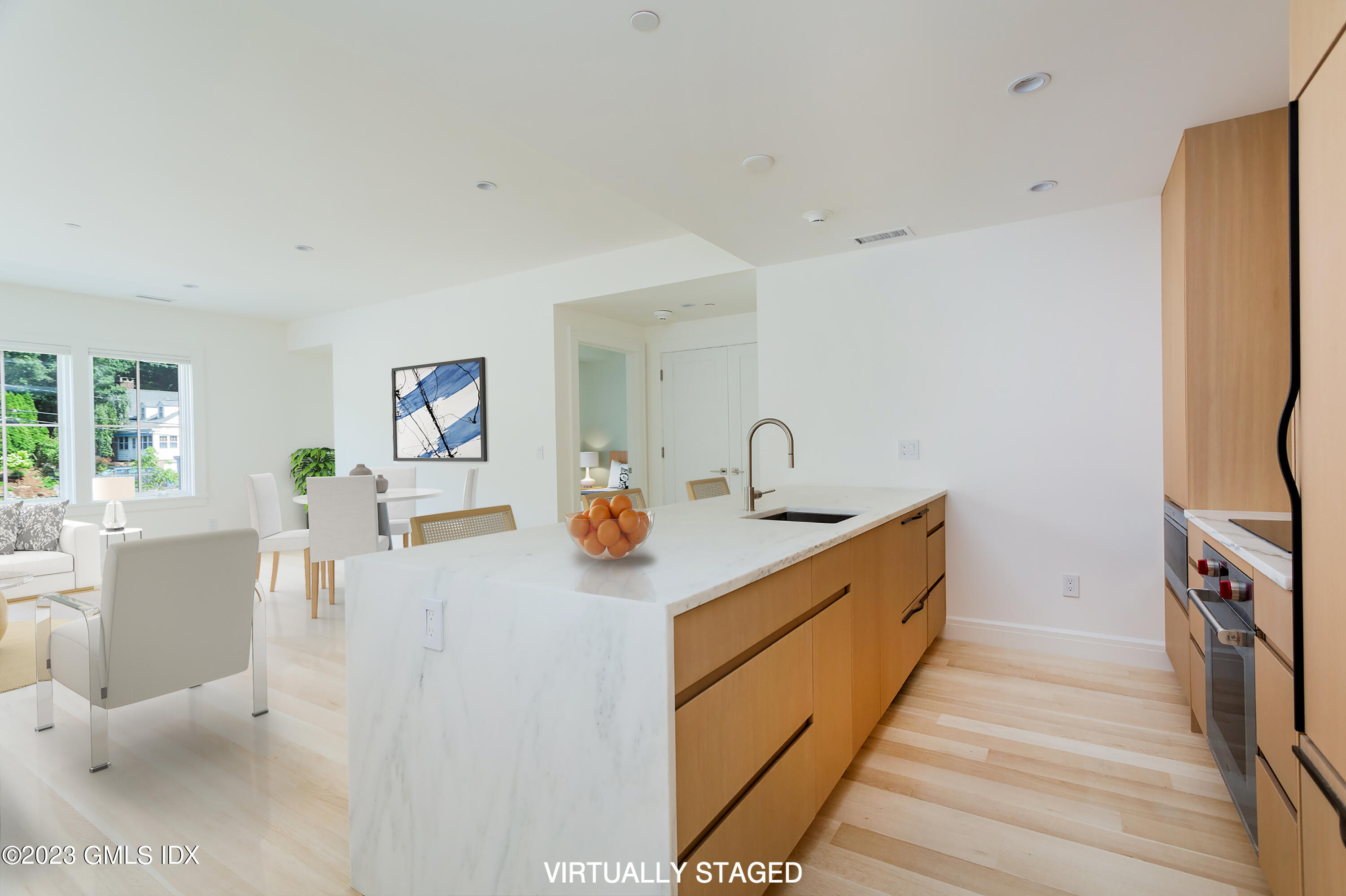 89 River Road, Unit 203 Cos Cob, CT 06807 - Photo 3 of 27 a view of living room with furniture and a window