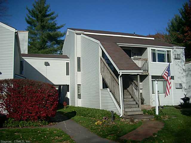 655 Talcottville Road, Unit 10 Vernon, CT 06066 - Photo 1 of 1 a view of a house with a yard