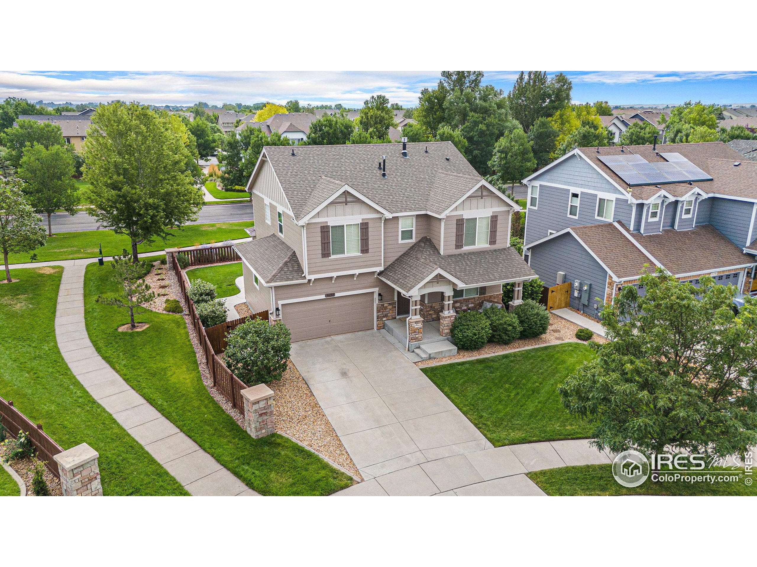 5622 Foxfire Street Timnath, CO 80547 - Photo 2 of 34 an aerial view of a house