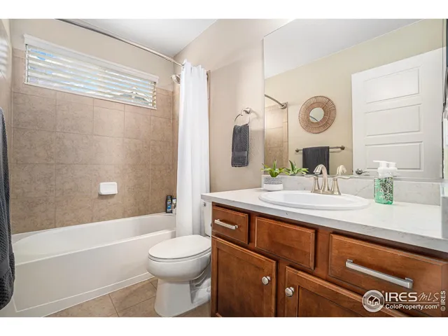 a bathroom with a sink a toilet and a bathtub