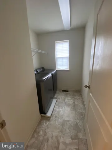 a view of a storage & utility room in a house
