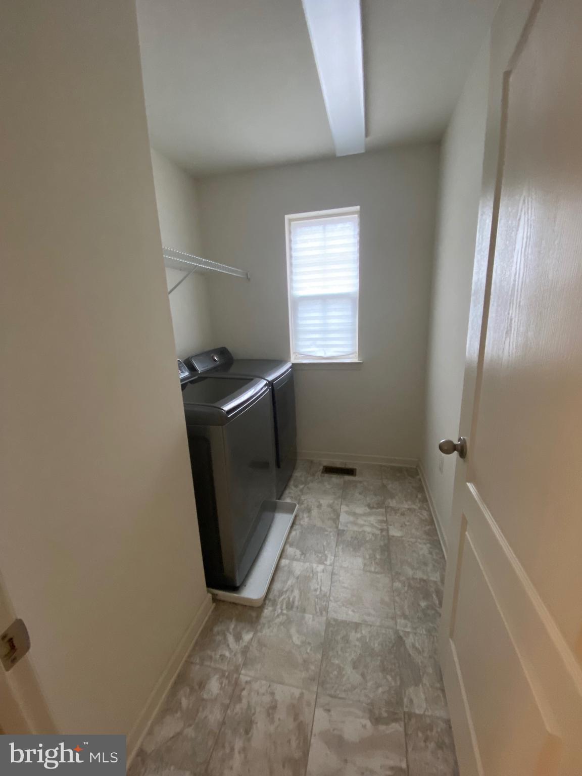 918 Ramble Run Road Baltimore, MD 21220 - Photo 11 of 23 a view of a storage & utility room in a house
