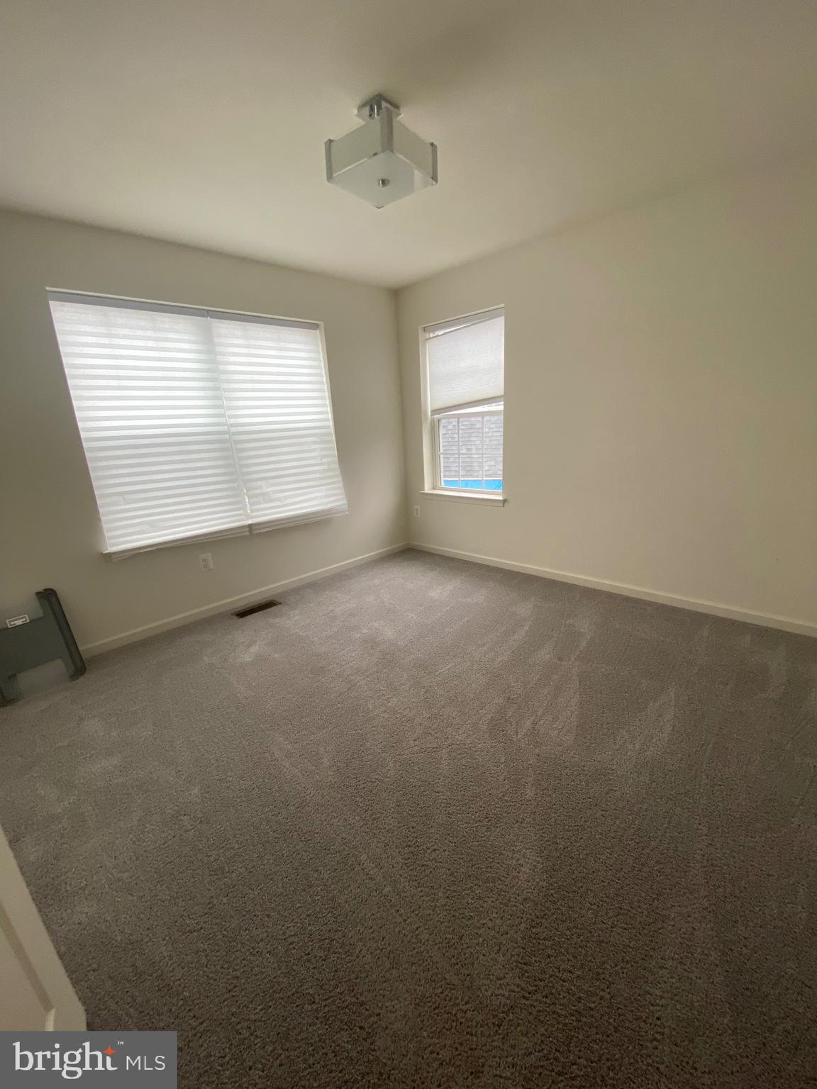 918 Ramble Run Road Baltimore, MD 21220 - Photo 12 of 23 an empty room with a window