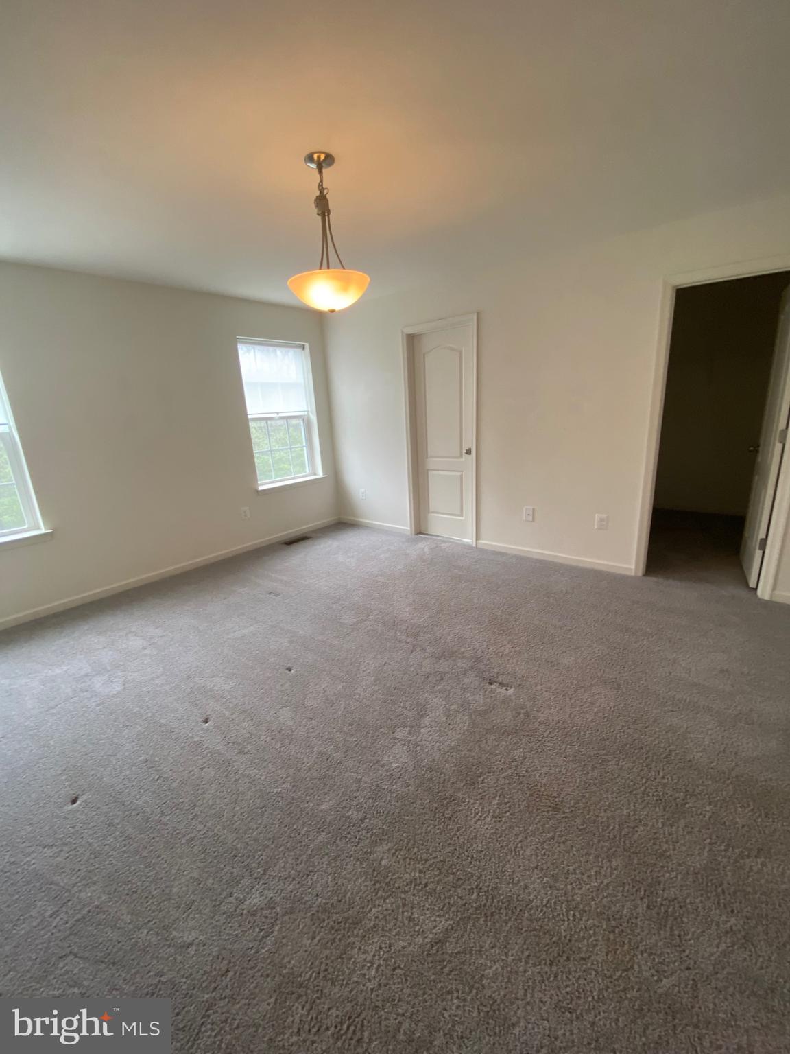 918 Ramble Run Road Baltimore, MD 21220 - Photo 15 of 23 a view of an empty room with a window