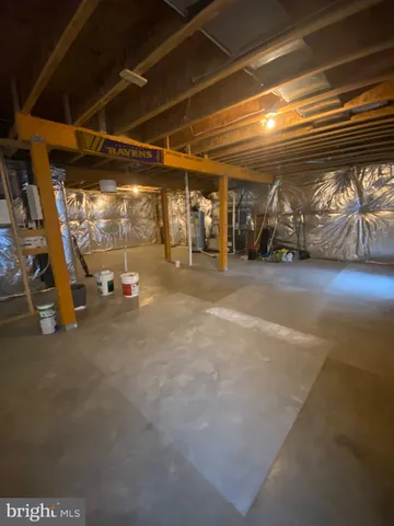 a view of parking garage with cars