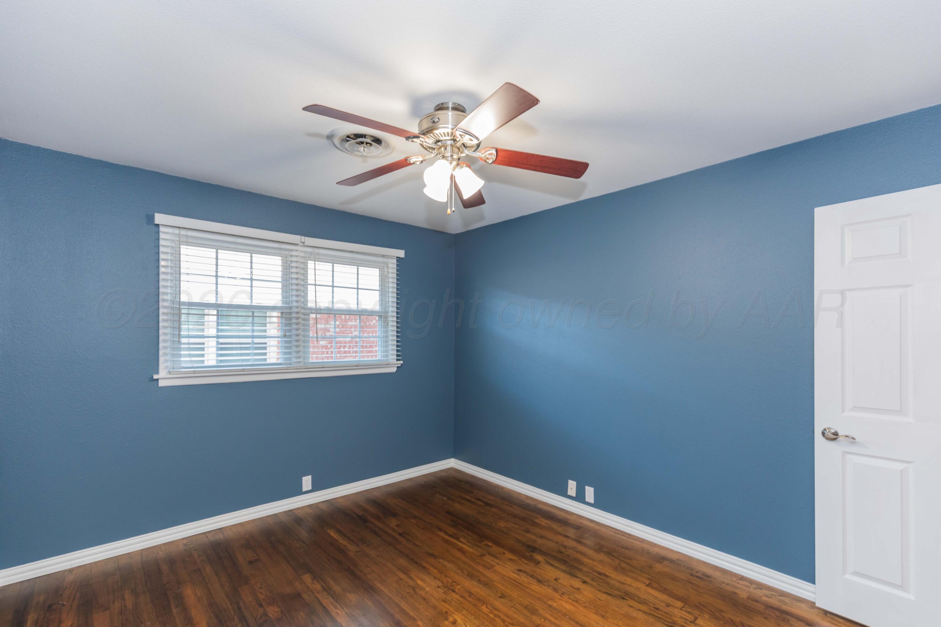4309 Olsen Boulevard Amarillo, TX 79106 - Photo 28 of 45 a view of room with window and ceiling fan