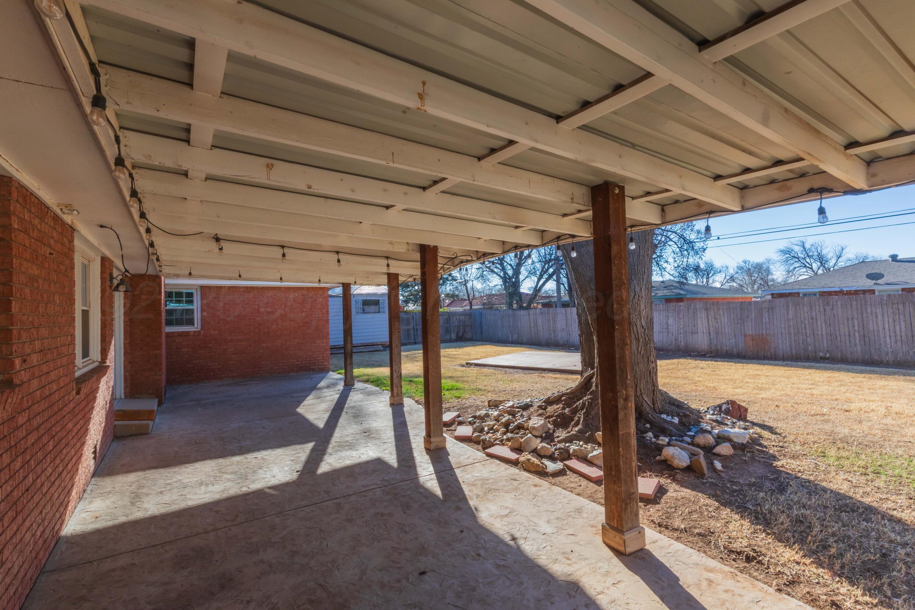 4309 Olsen Boulevard Amarillo, TX 79106 - Photo 7 of 45 a view of a backyard