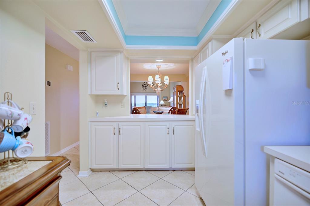 2025 Sylvester Road, Unit H2 Lakeland, FL 33803 - Photo 14 of 59 a kitchen with white cabinets