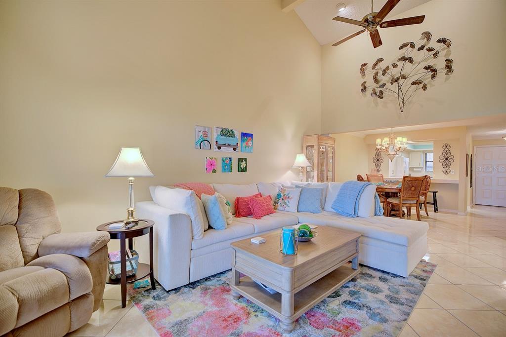 2025 Sylvester Road, Unit H2 Lakeland, FL 33803 - Photo 17 of 59 a living room with furniture and wooden floor